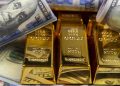 الذهب يتراجع مع صعود الدولار وتراجع التوتر التجاري بين واشنطن وبكين